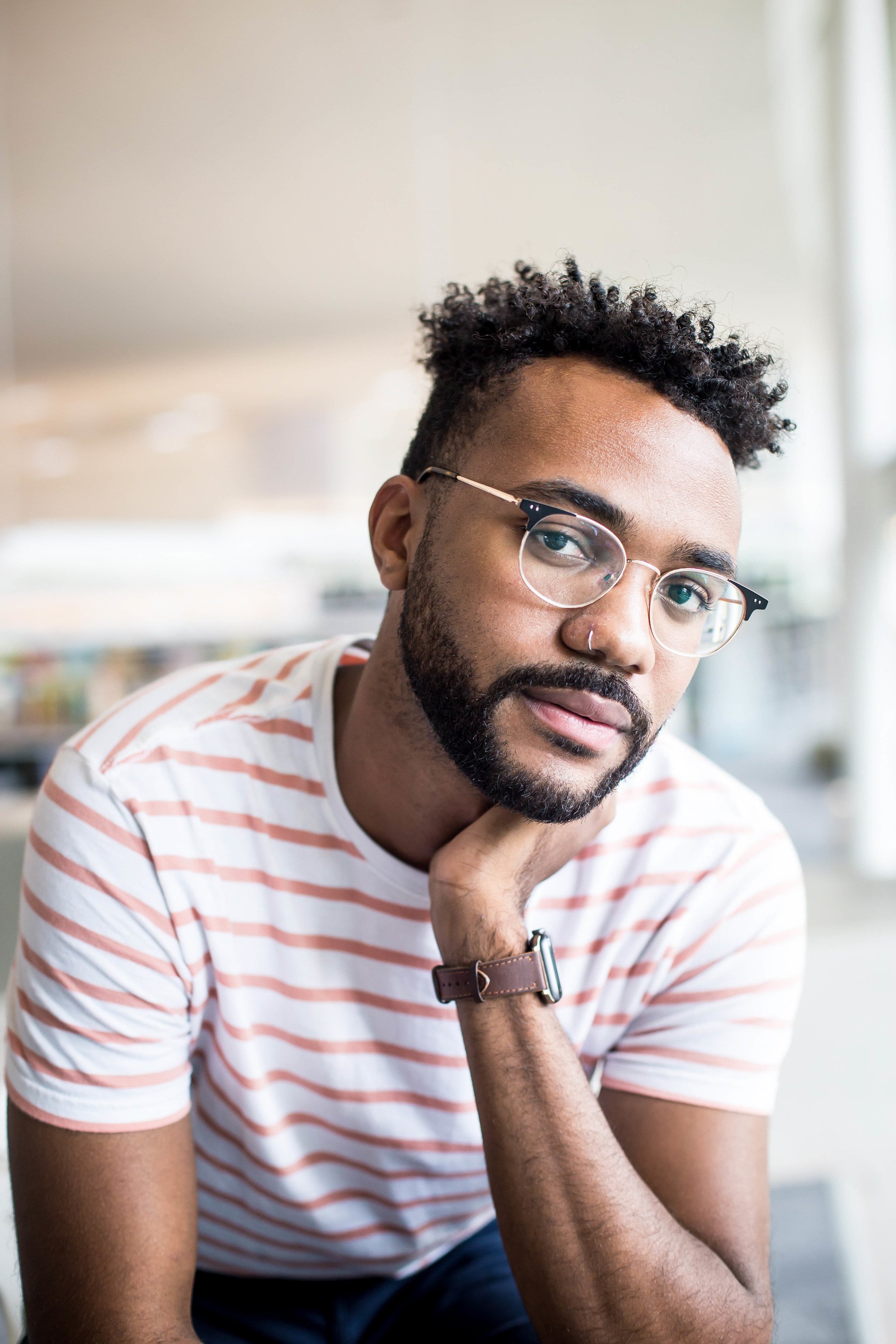 man with an undercut and messy top hairstyle