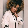 woman with natural hair and ombre