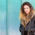 lady with long wavy hair and ombre hair colour