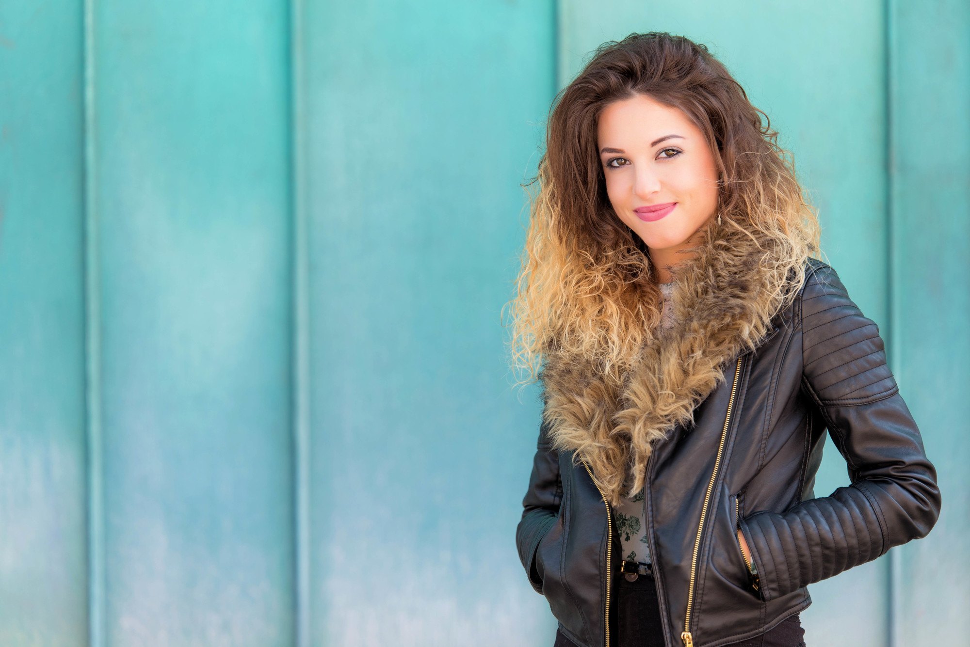 lady with long wavy hair and ombre hair colour
