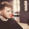 man with undercut fade comb over men's hairstyles for round faces