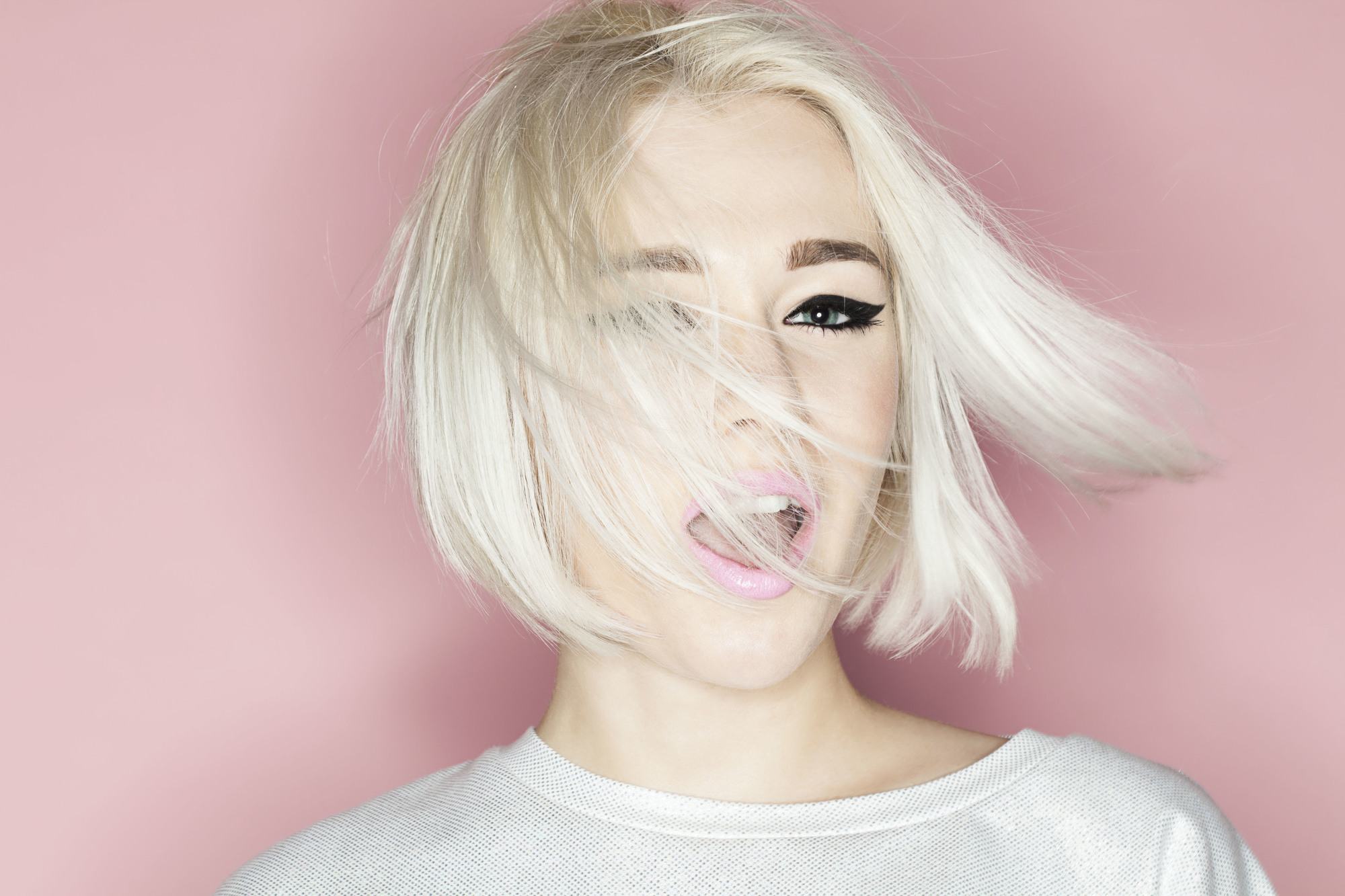 woman with short bleached hair white hair platinum blonde bob