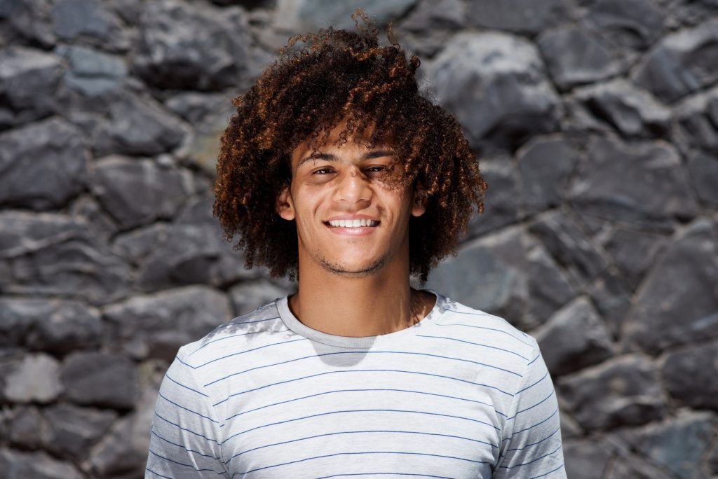 man with Long Tight Curls