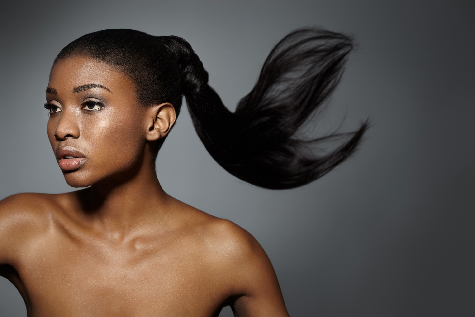 woman with a wrapped ponytail hairstyle