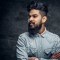 man with a full beard and undercut