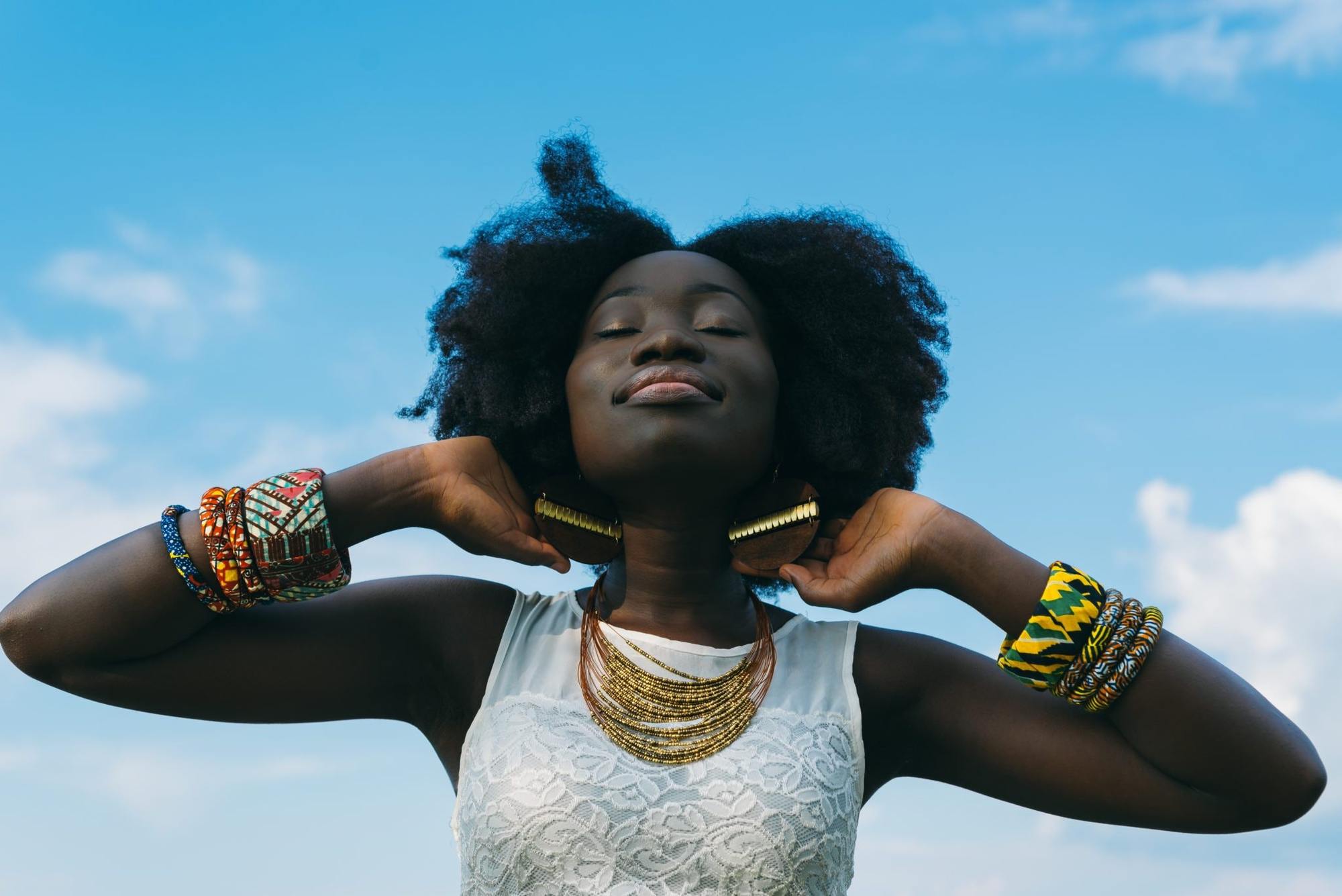 woman of colour with long afro hair