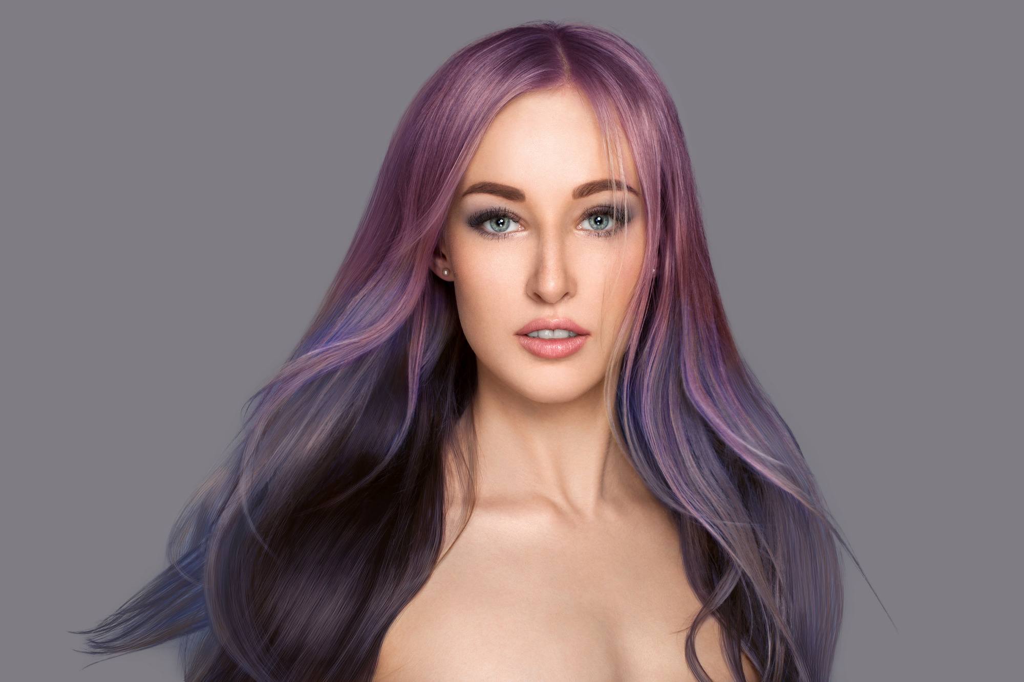 freshly dyed hair: woman with long pink and purple dyed hair