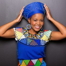 woman wearing traditional Zulu clothing and headwear