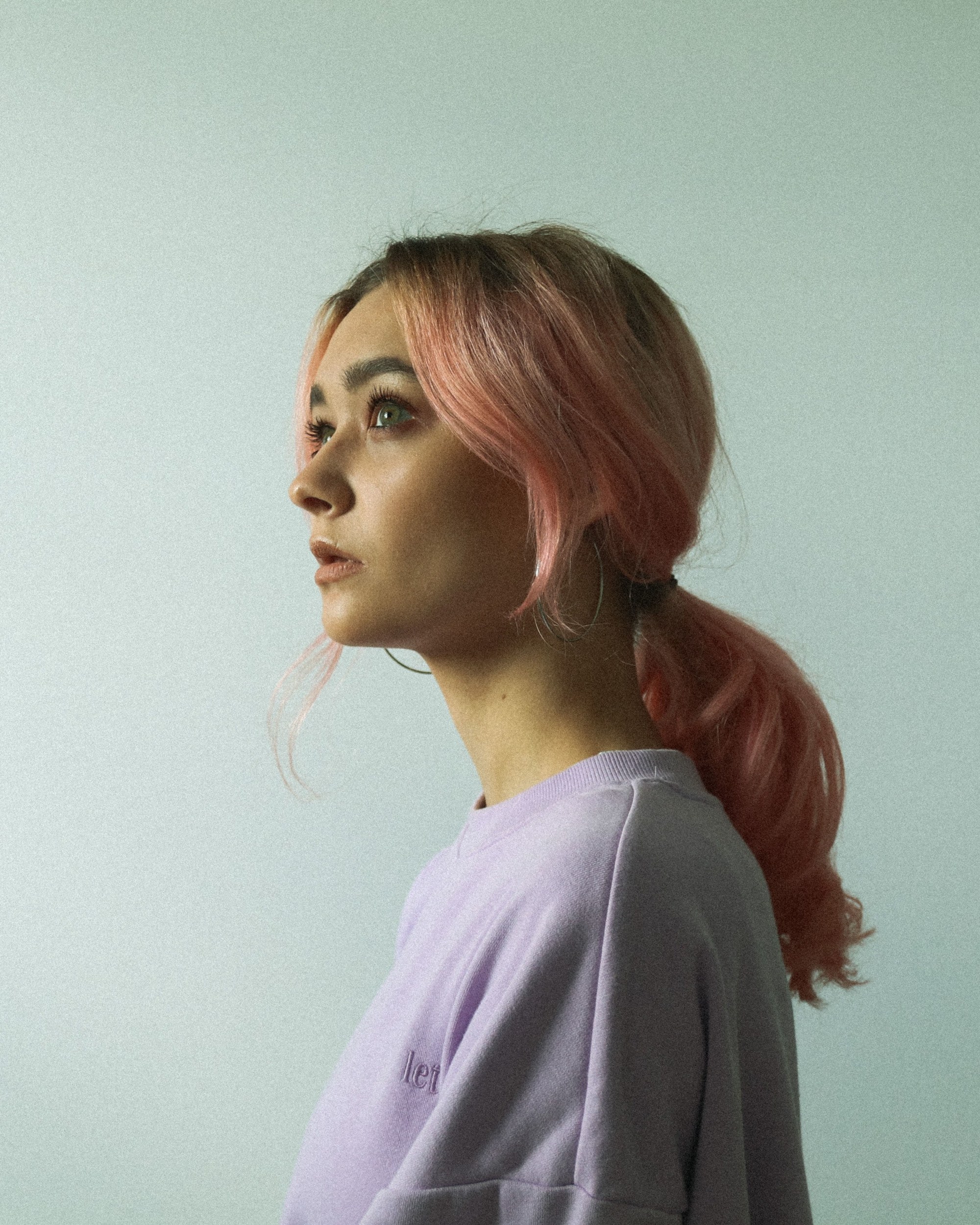 woman with multicoloured pastel tresses