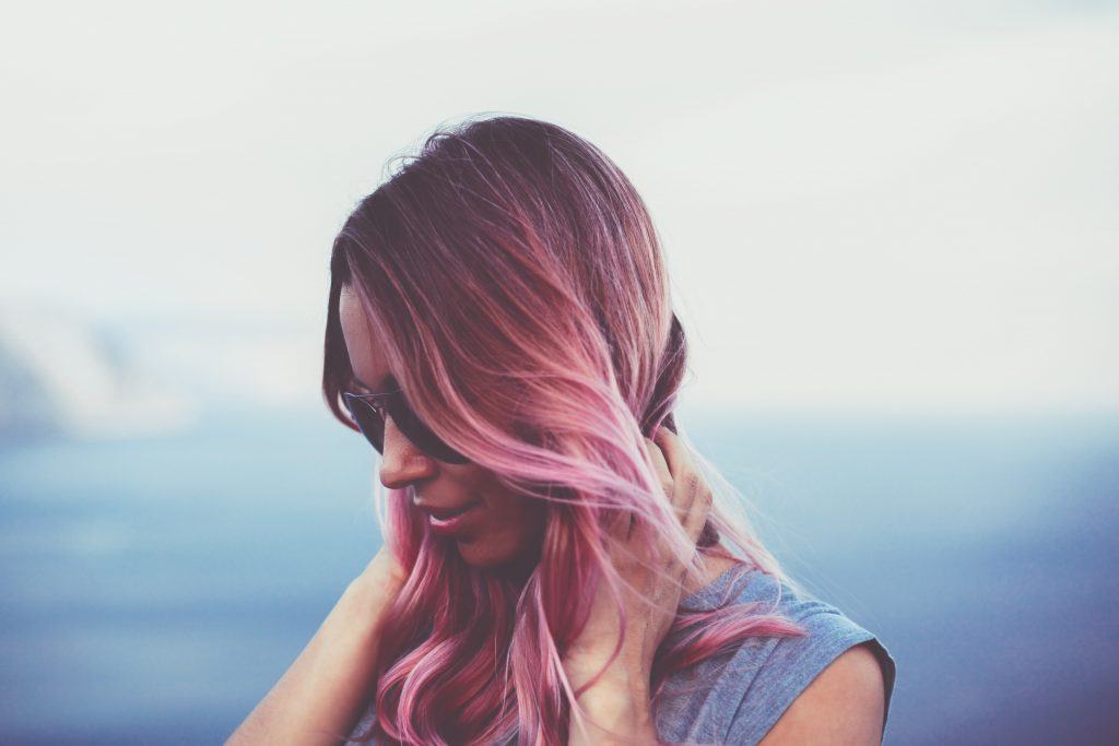 woman with ombre pink hair