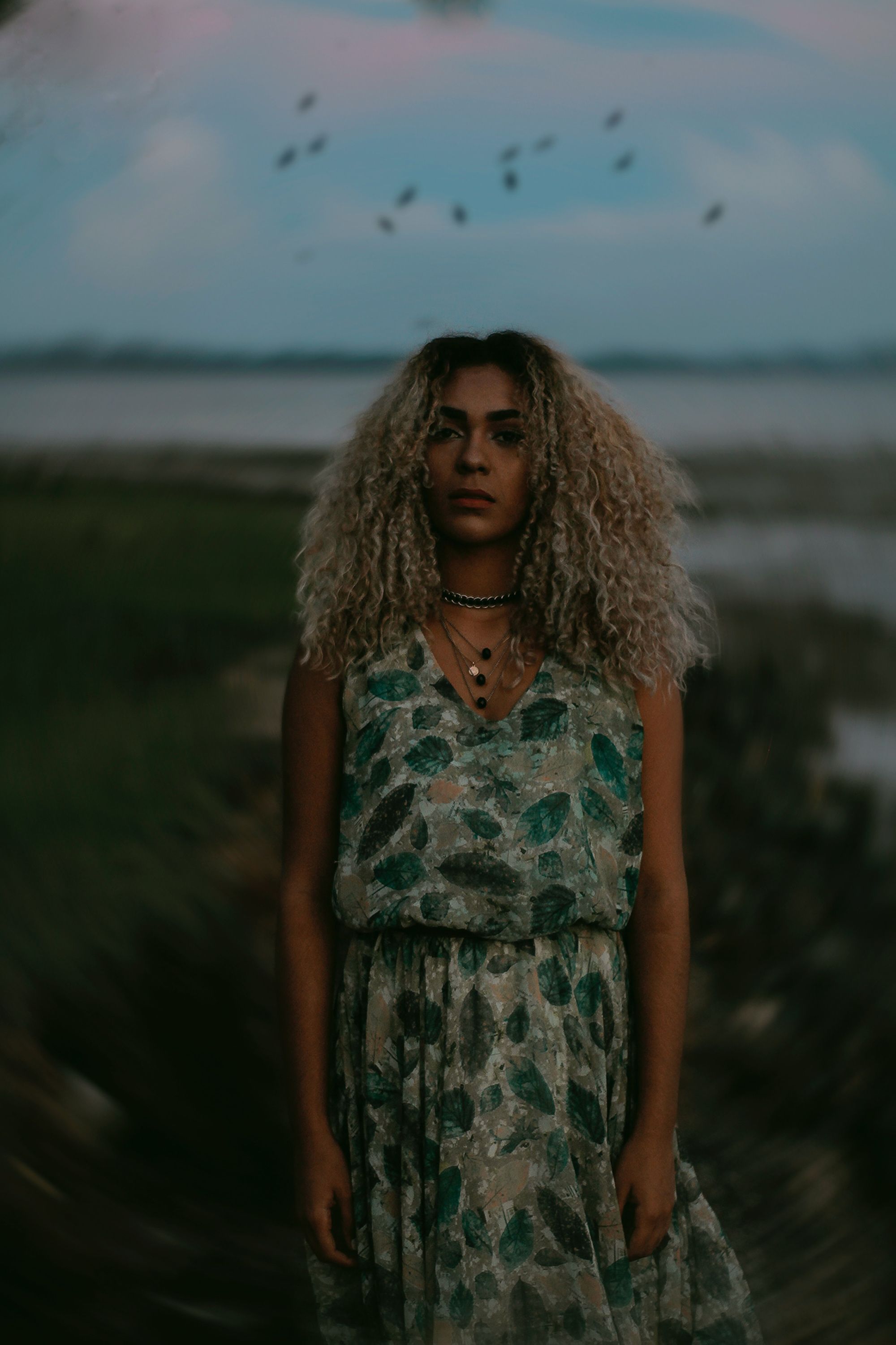 touch-up your roots: woman with long curly blonde hair