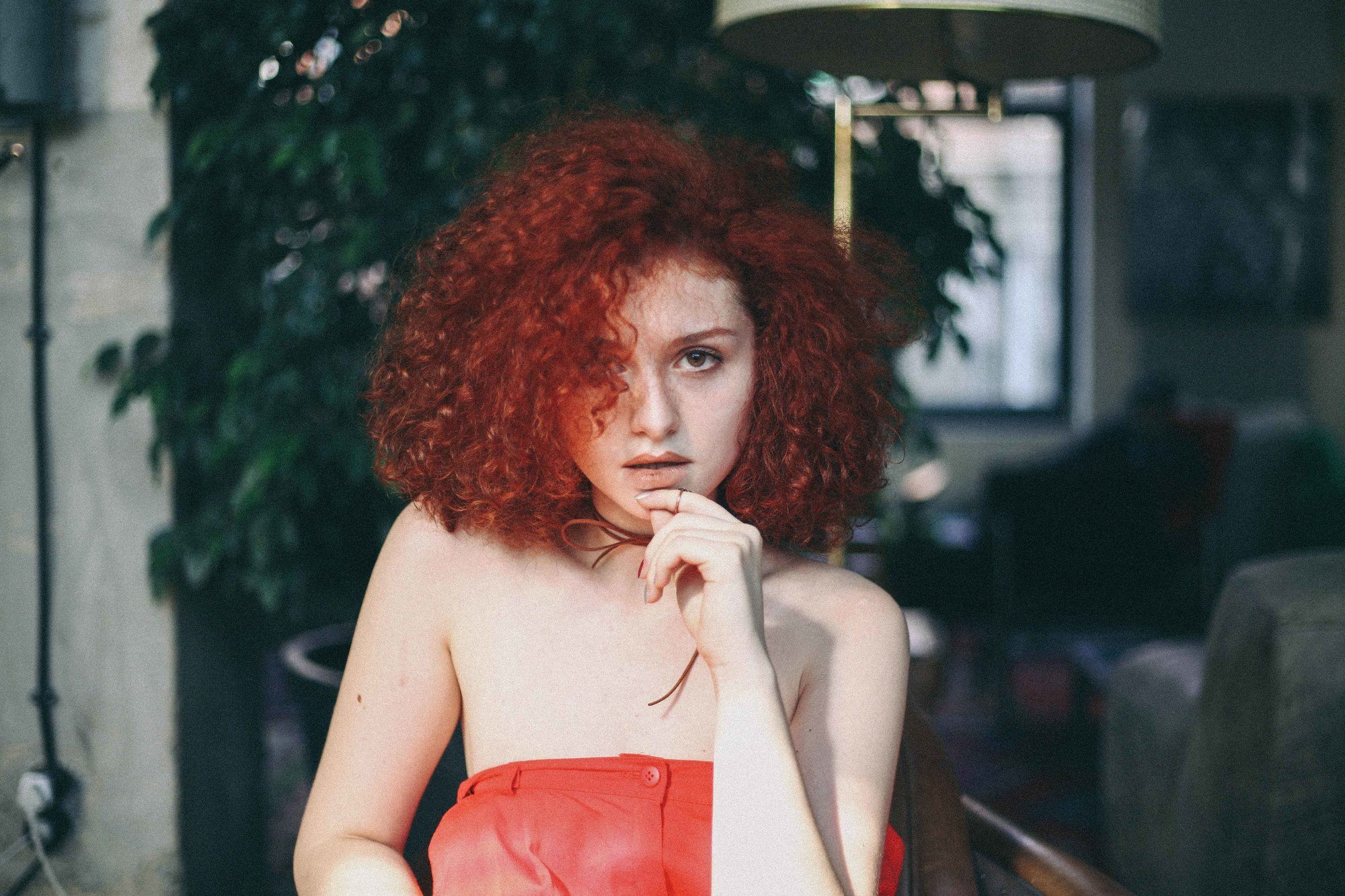 woman with curly red hair