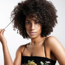 deep condition your hair: woman with full afro hairstyle