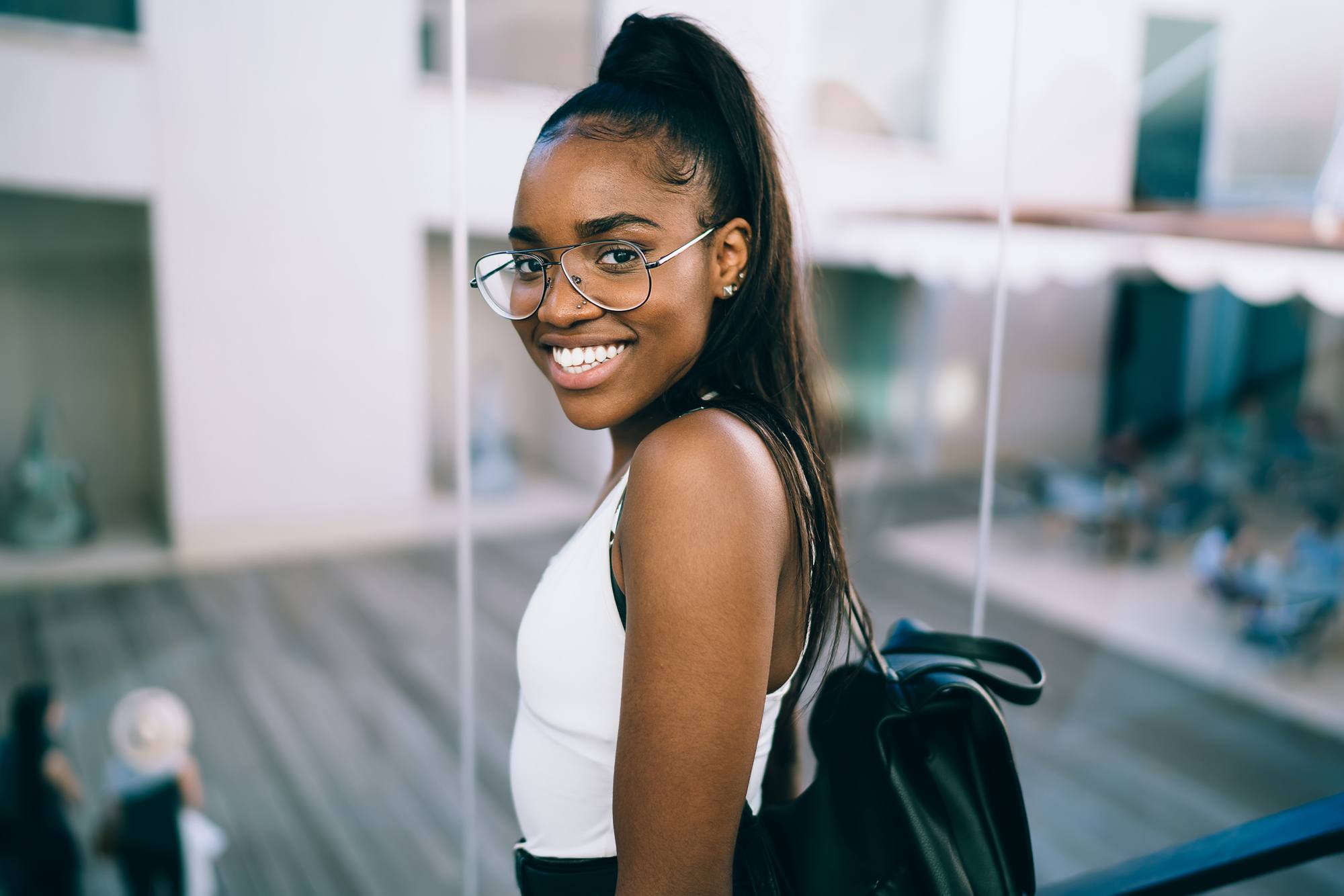 hairstyle ideas for work: woman wearing a classic ponytail