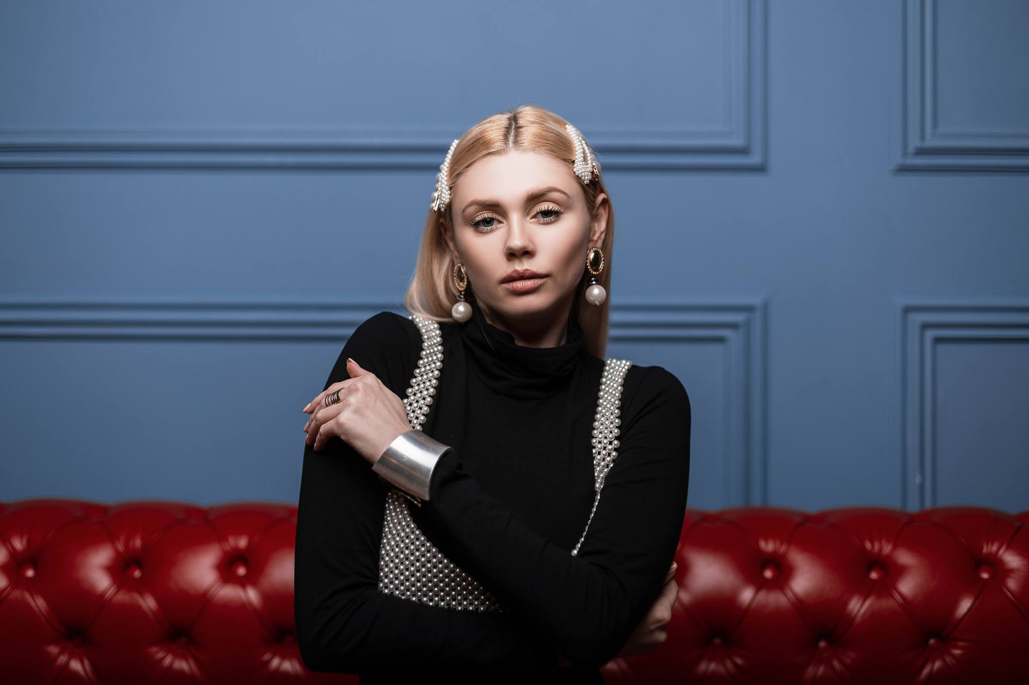 back to work hairstyle ideas: woman with blonde hair wearing a pinned-back style