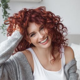 curl medium length hair: woman shoulder length, red curly hair