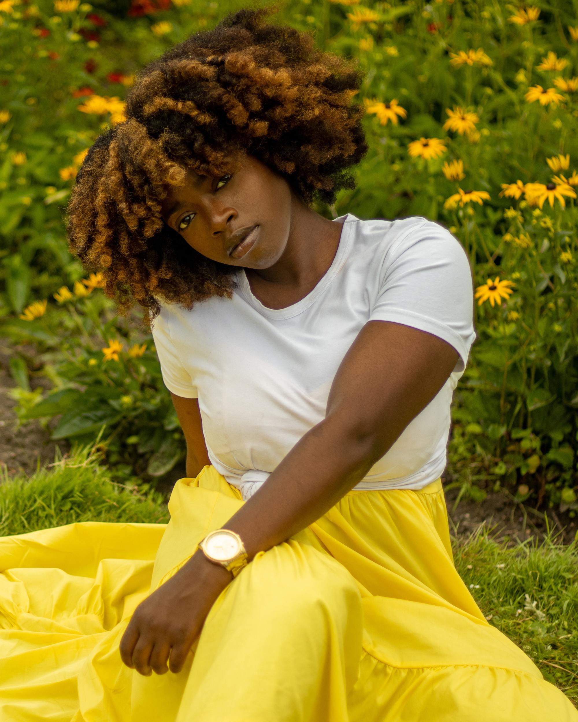 woman with shades of brown natural curls