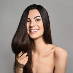 keratin smoothing treatments: woman with long silky brown hair