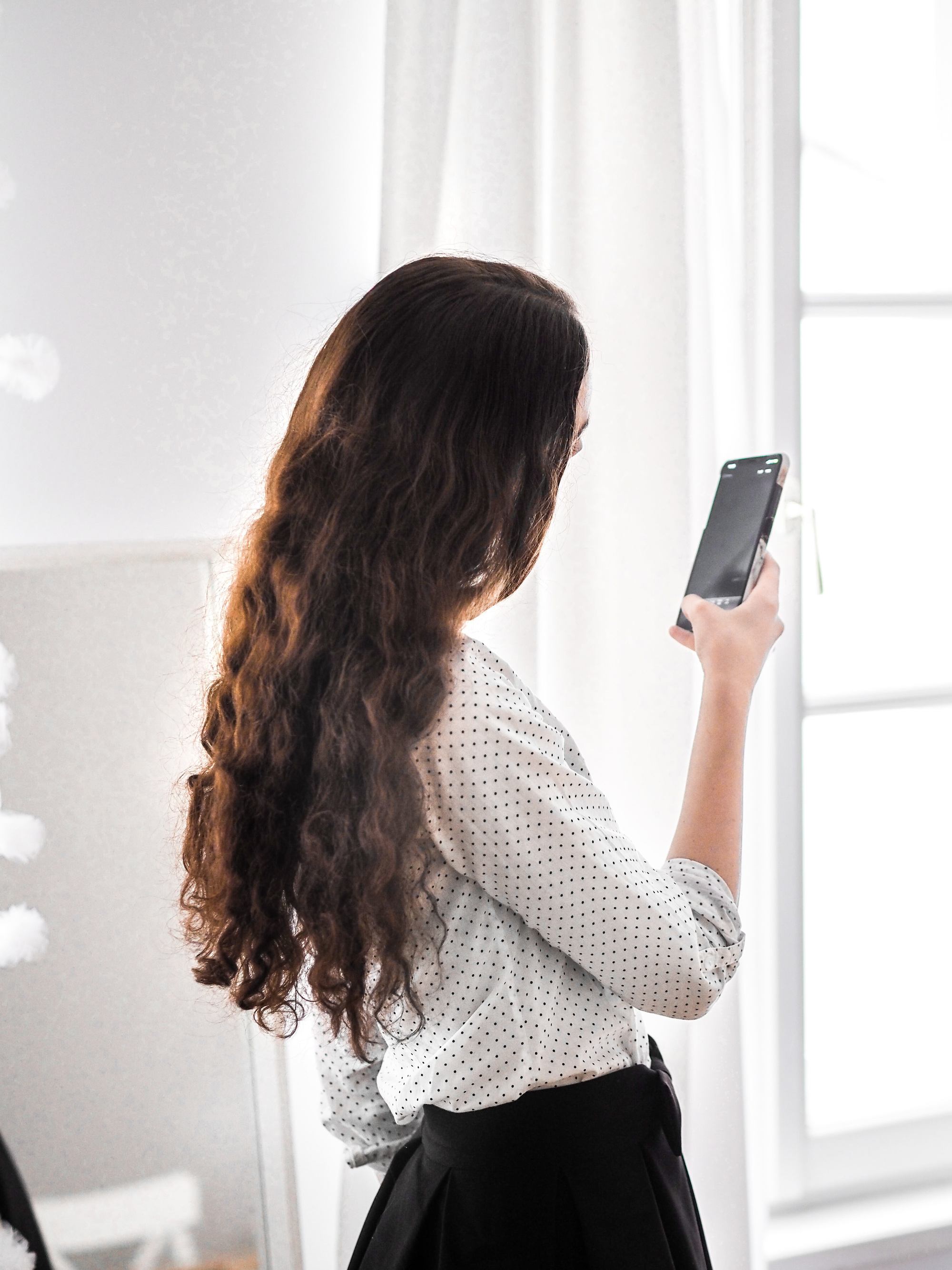 woman with long wavy hair - created using the braid hack