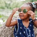 Little girl with twists and sun glases