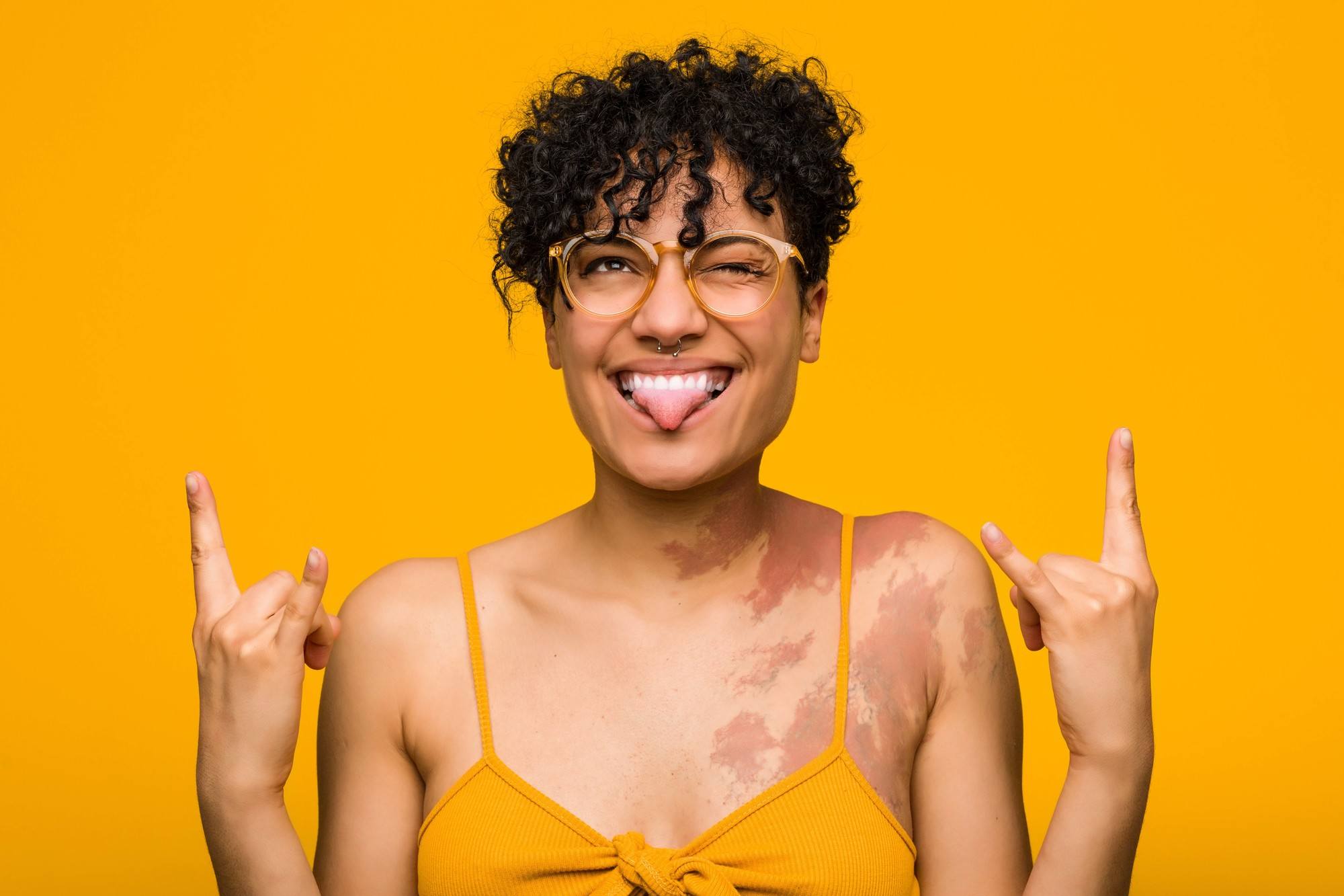 Woman with short curly pixie hairstyle