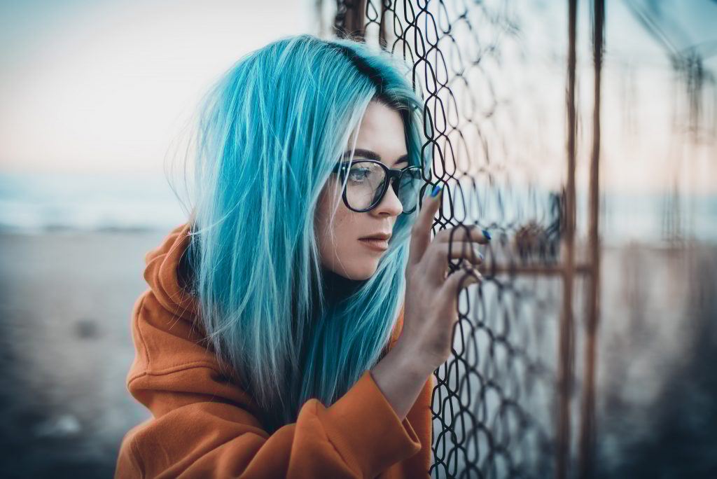 Woman with Aquarius pastel blue hair