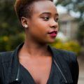 Woman wearing an undercut Pride hairdo