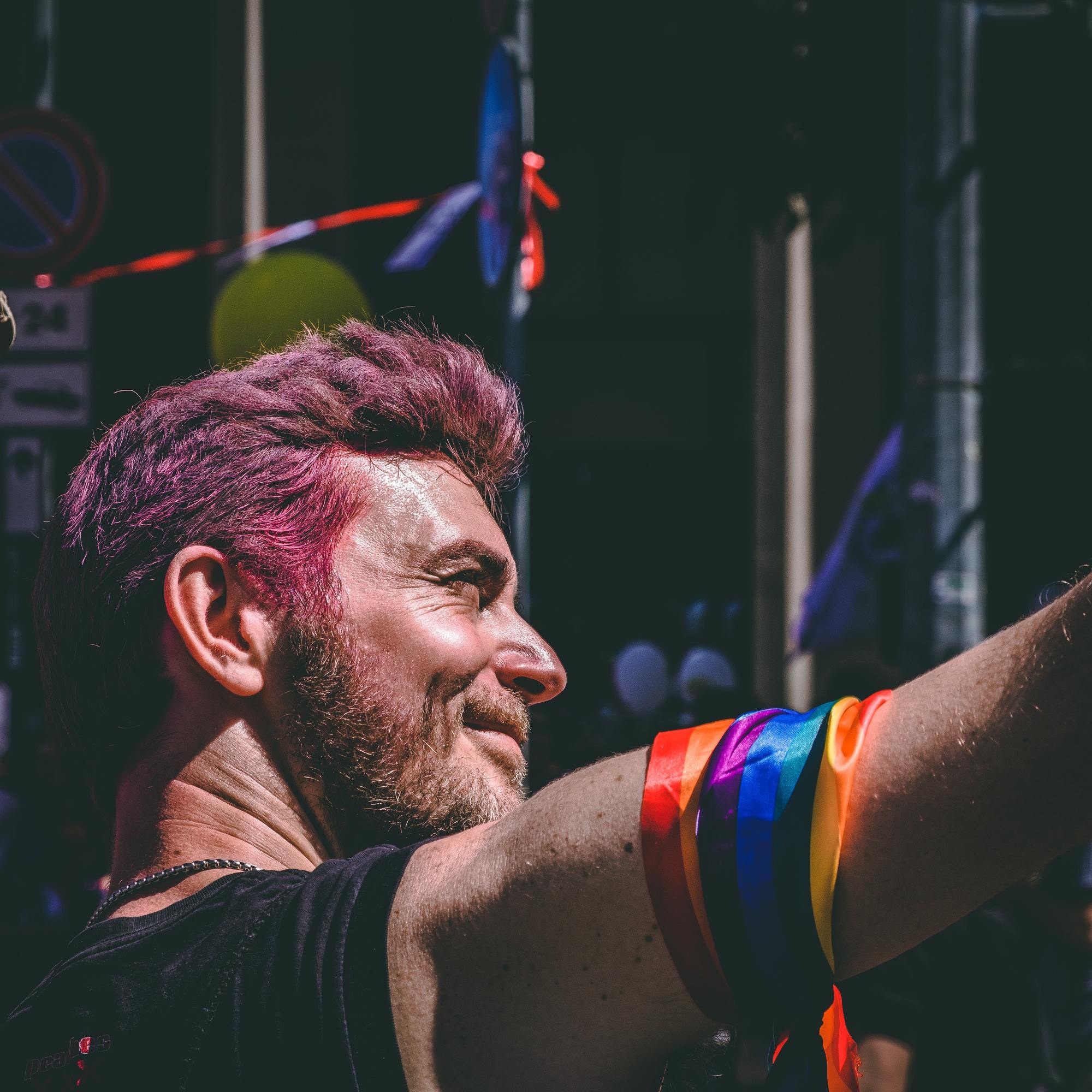 Man with pink hair colour for Pride