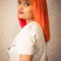Woman with orange hair colour