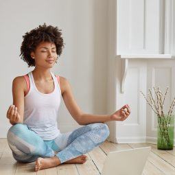 Woman keeping calm by doing breathing exercises