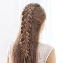 long medium brown hair with a complex centre braid