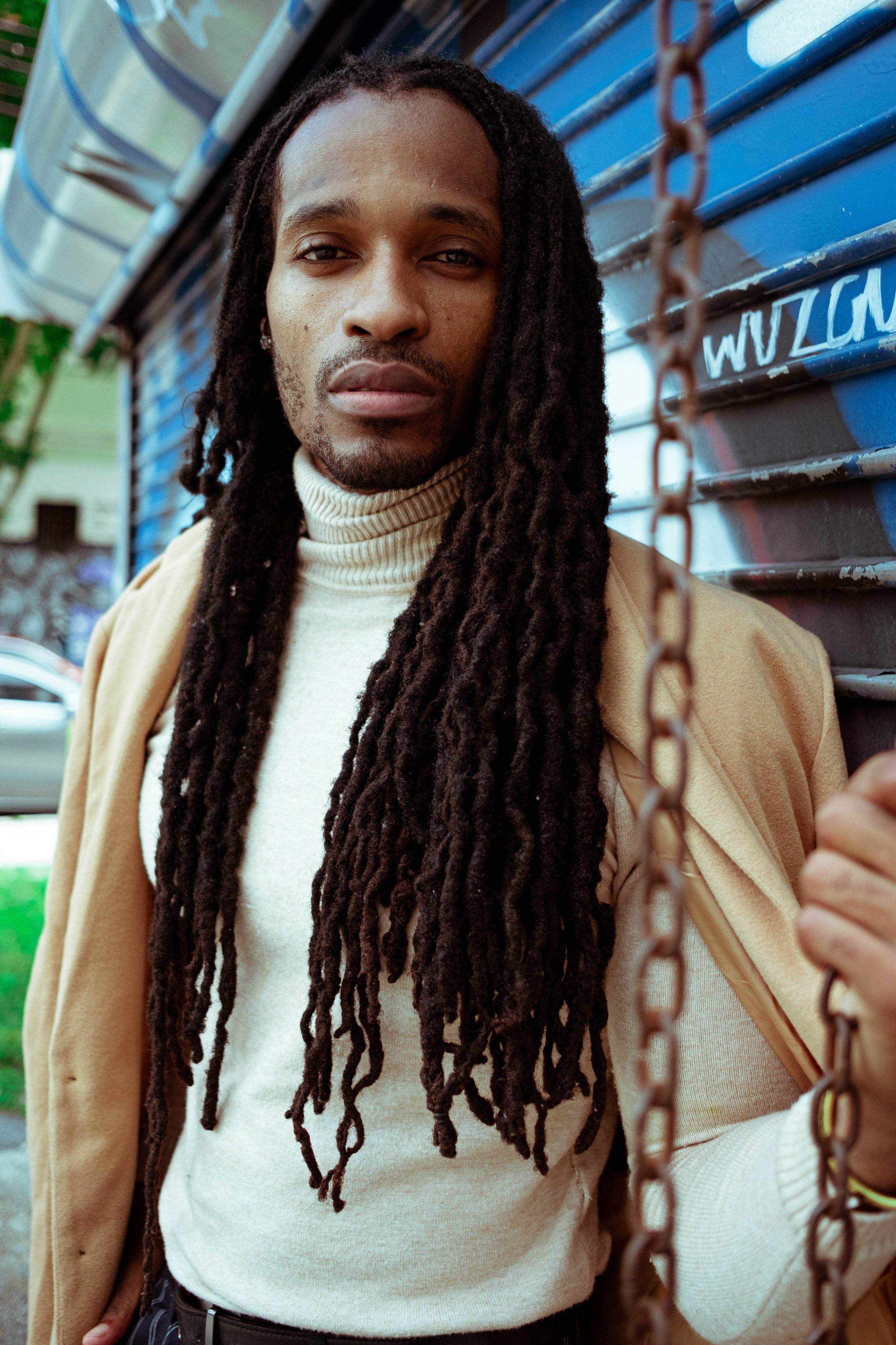 Man with long curly hair