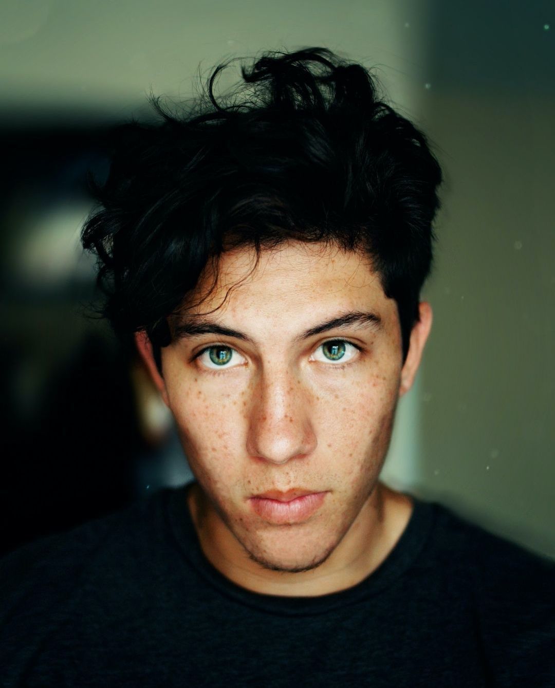 young man with short black hair