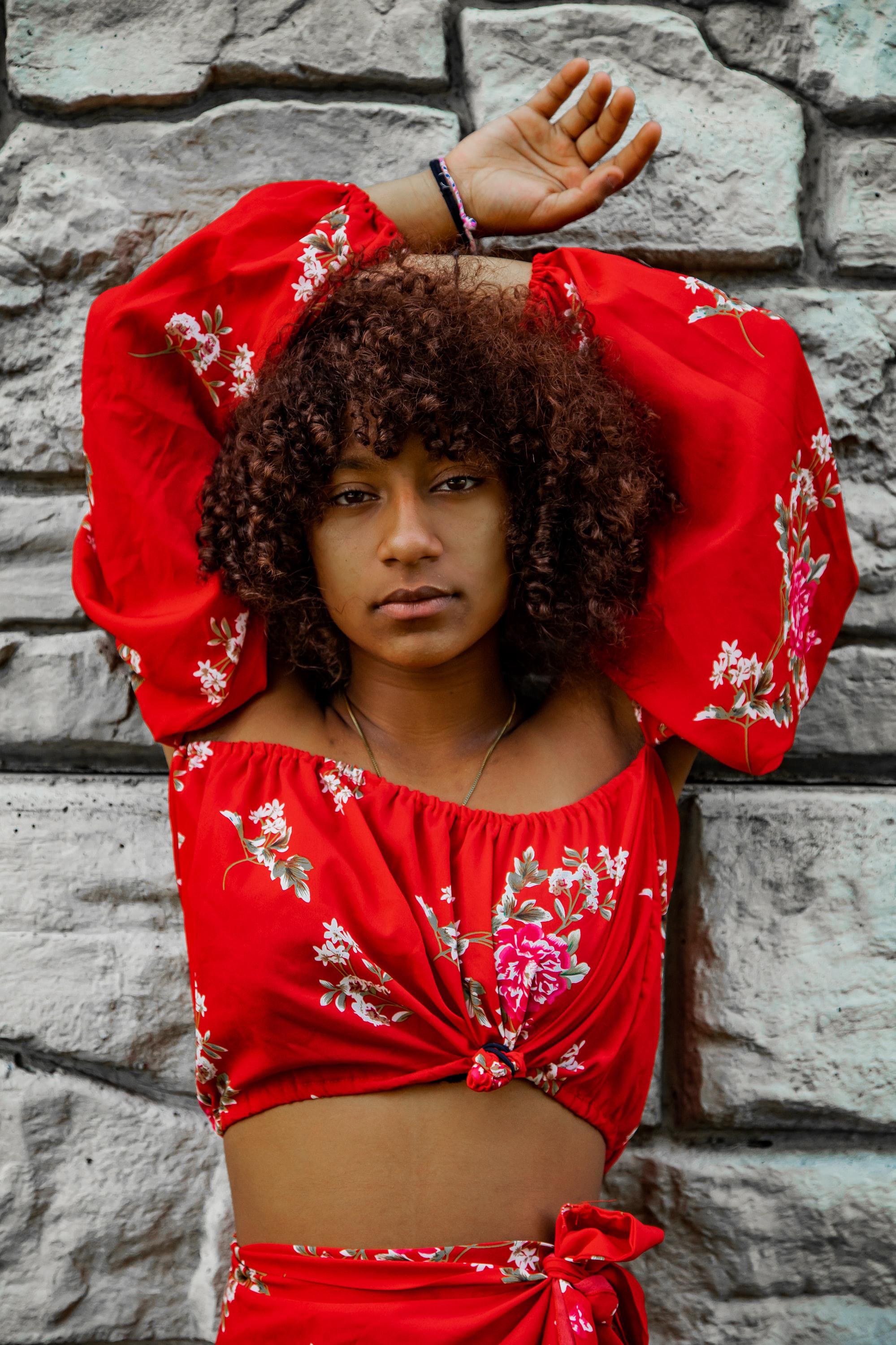 Woman with curly cinnamon hair