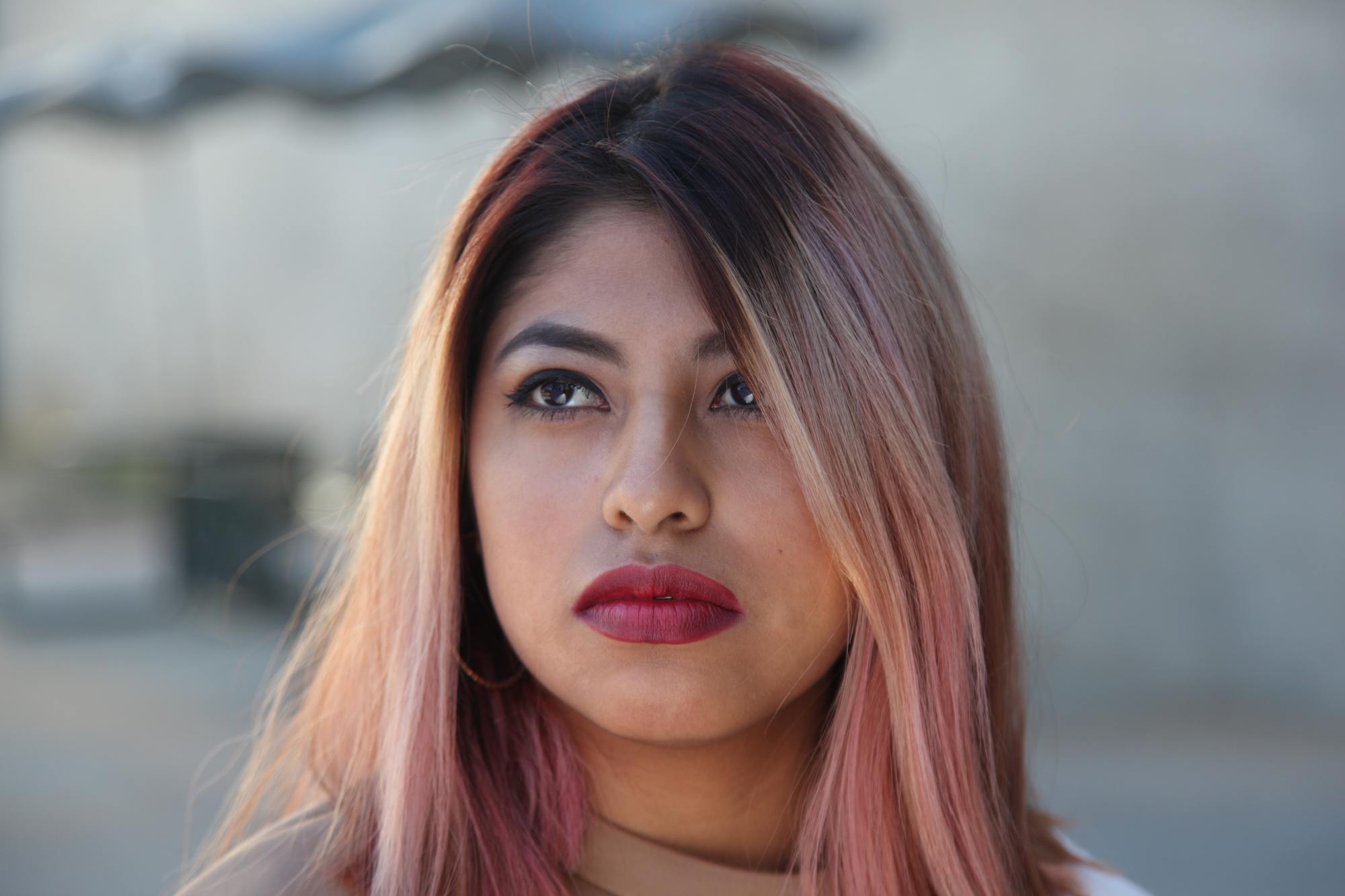 Woman with light pink dyed hair