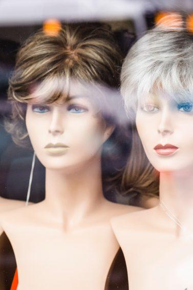 Choosing the right wig: image of wigs in a store window
