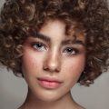 Woman with short tight curls
