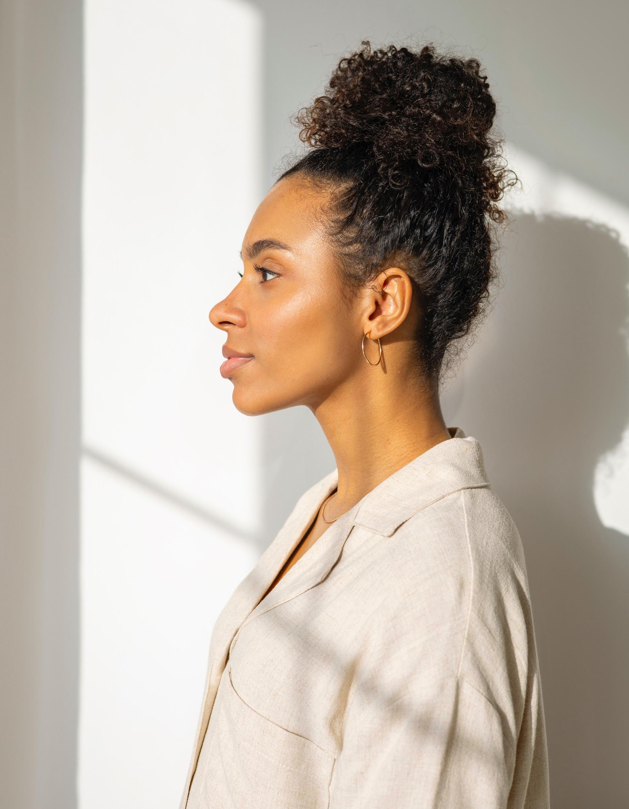 Woman with a casual curly updo