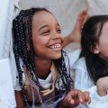 Little girl with colourful braids