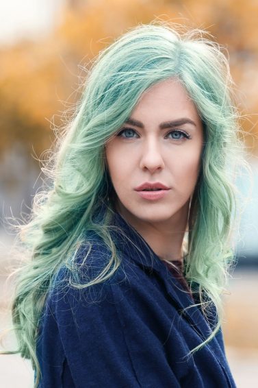 summer hair colour: woman with pastel green hair