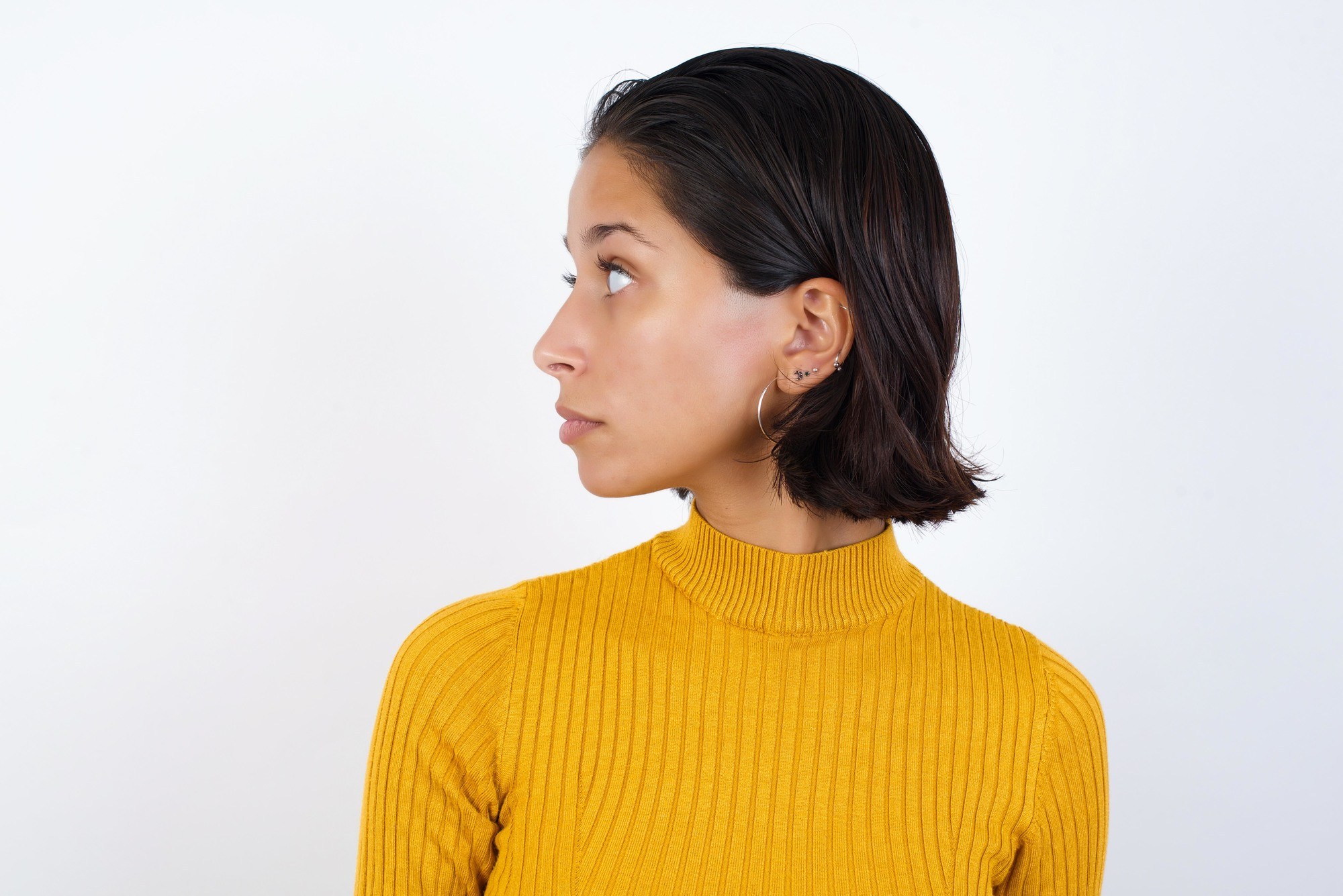 Woman with short slicked back hair