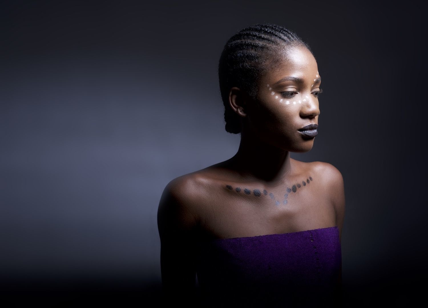 New York Fashion Week 2022: woman with cornrows hairstyle braided in straight backward lines