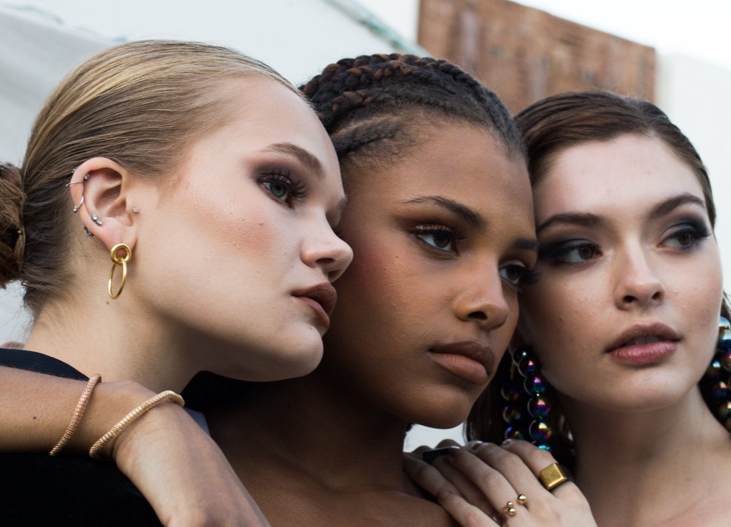 New York Fashion Week 2022: image of three women with different hairstyles