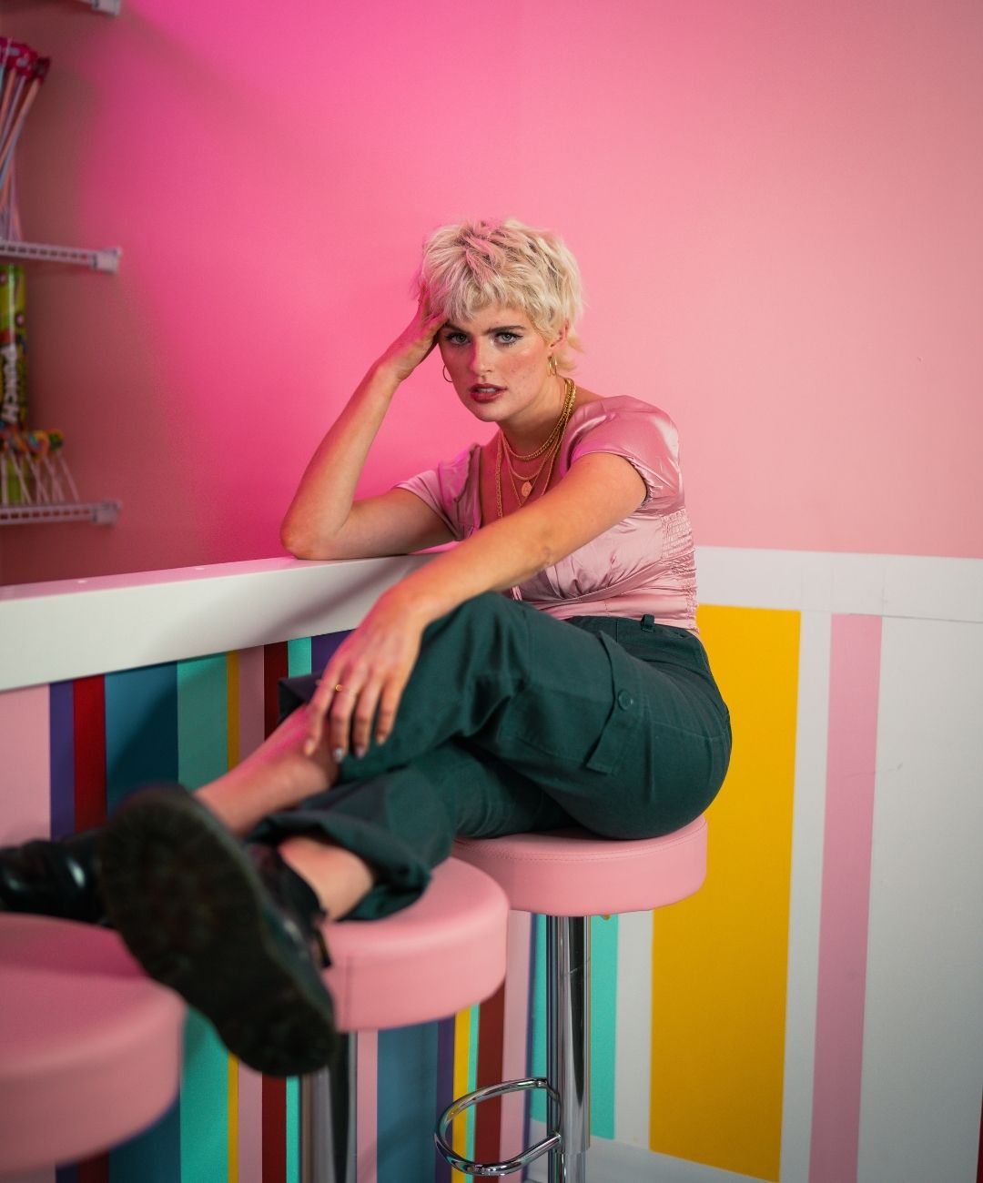 woman with a bright blonde pixie haircut