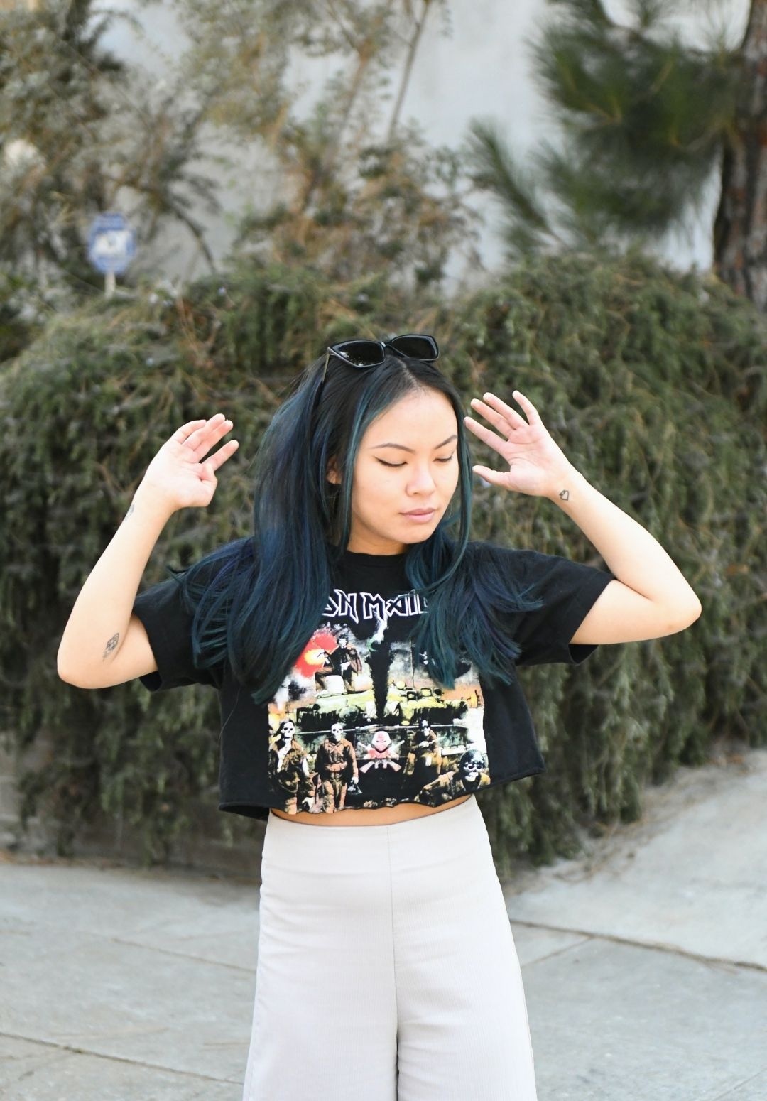 hair colour inspiration: woman with dark blue/teal coloured hair