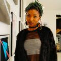 girl with green hair tied into an updo