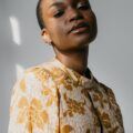 Stranger Things hairstyles: woman with a very short, buzzcut hairstyle