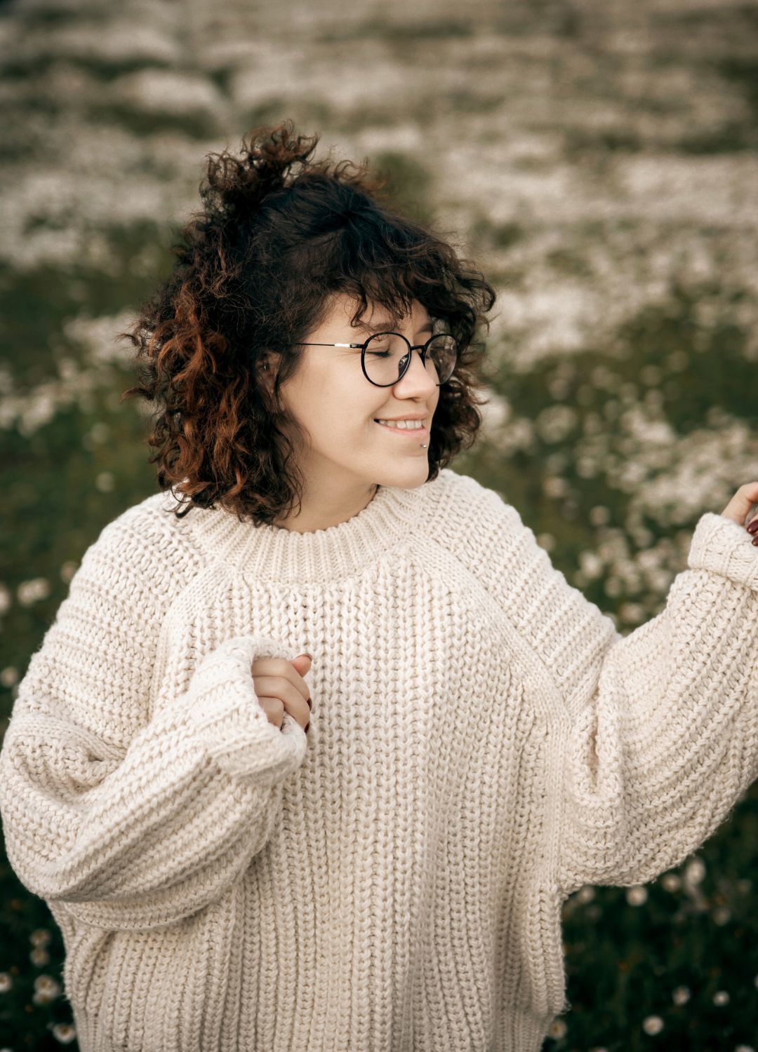 fine curly hair: woman with neck-length curly brown hair