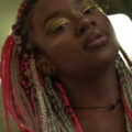 Woman with pink and blonde braids