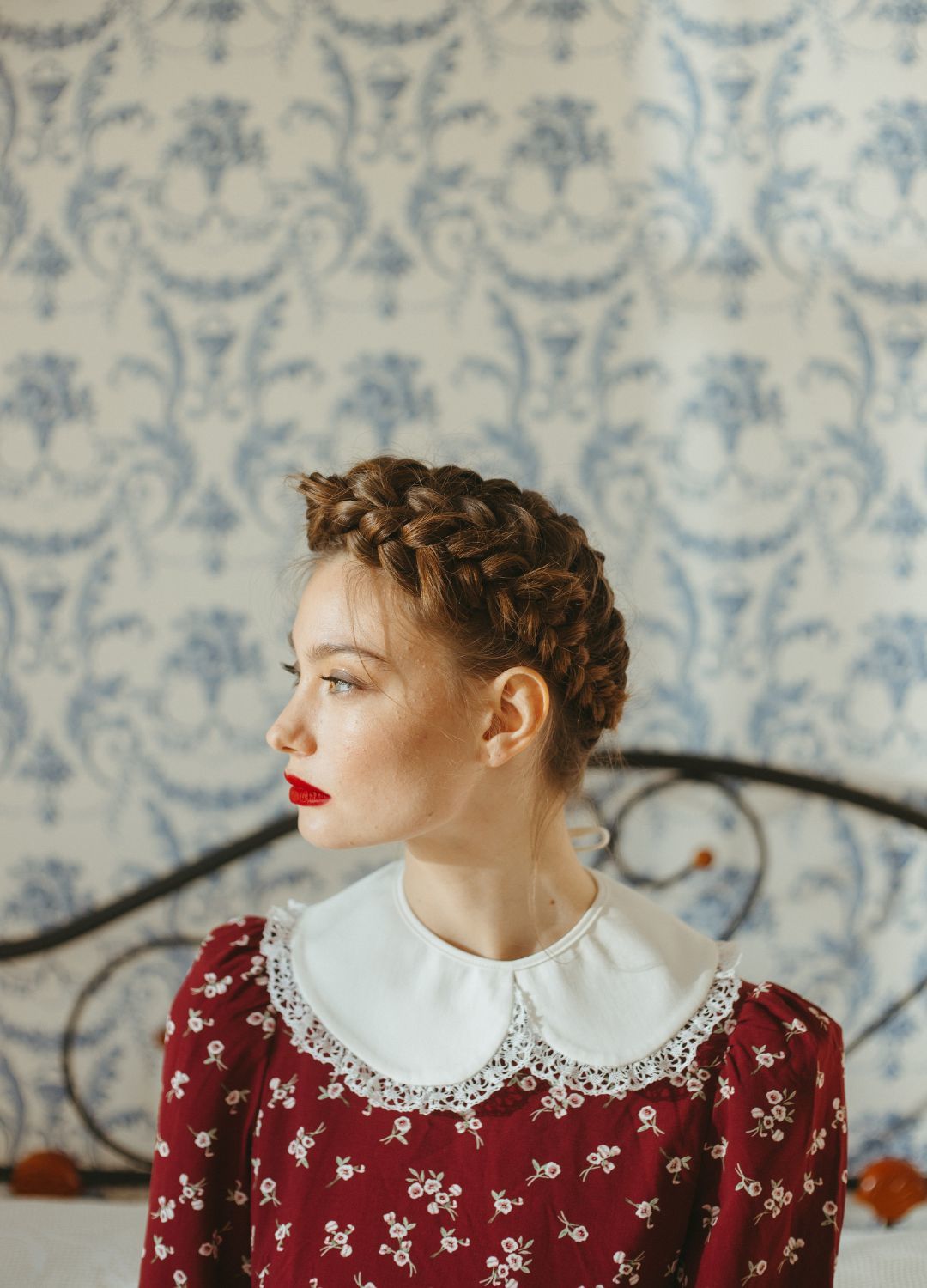 braids around your head: Woman with brown hair, tied into a thick plait that is wrapped around her head